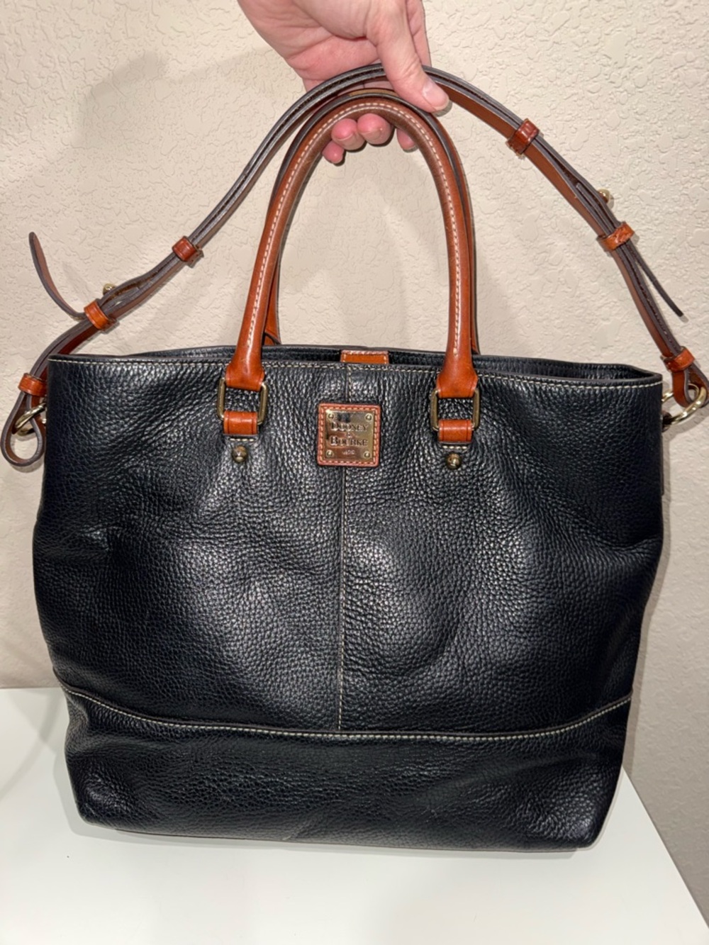 Dooney & Bourke Black Pebbled Leather Tote with Brown Trim and Strap